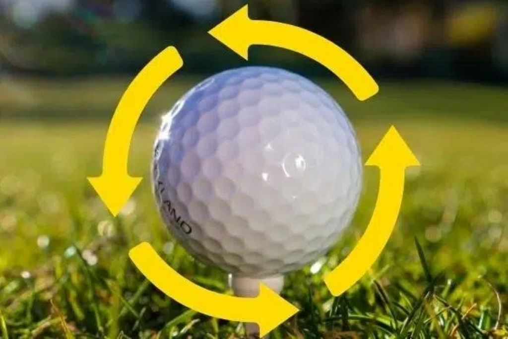 Golfer teeing off with a driver, ball soaring far down the fairway, demonstrating the lift and distance benefits of golf ball dimples.