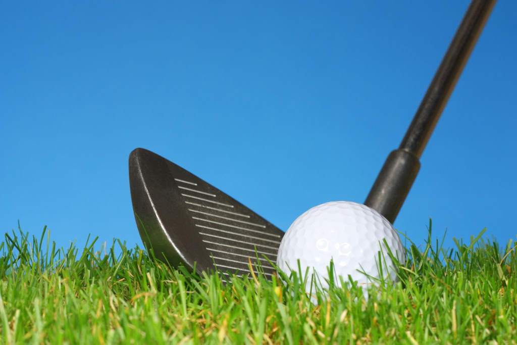 Golf short game with wedge and ball